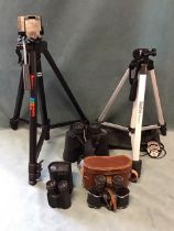 A pair of 30s leather cased binoculars with adjustable focus; a pair of Rocktrail 10x58