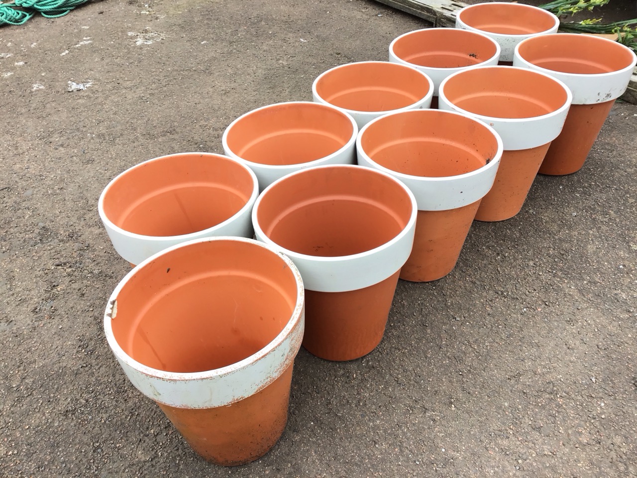 Ten tapering traditional teracotta flower pots with while painted bands to rims. (12.25in) (10) - Image 3 of 3