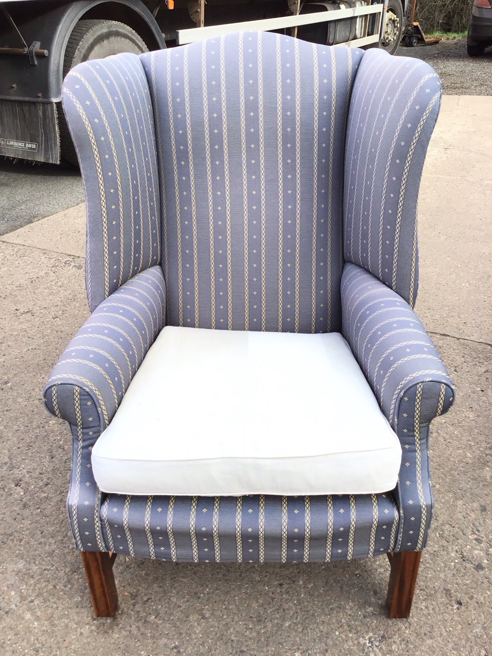A Georgian style upholstered wing armchair, the arched back above a flared rectangular seat with - Image 2 of 3
