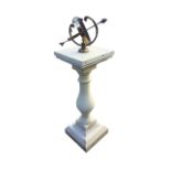 A reproduction brass orrery sundial with armillary sphere on baluster shaped stone column on