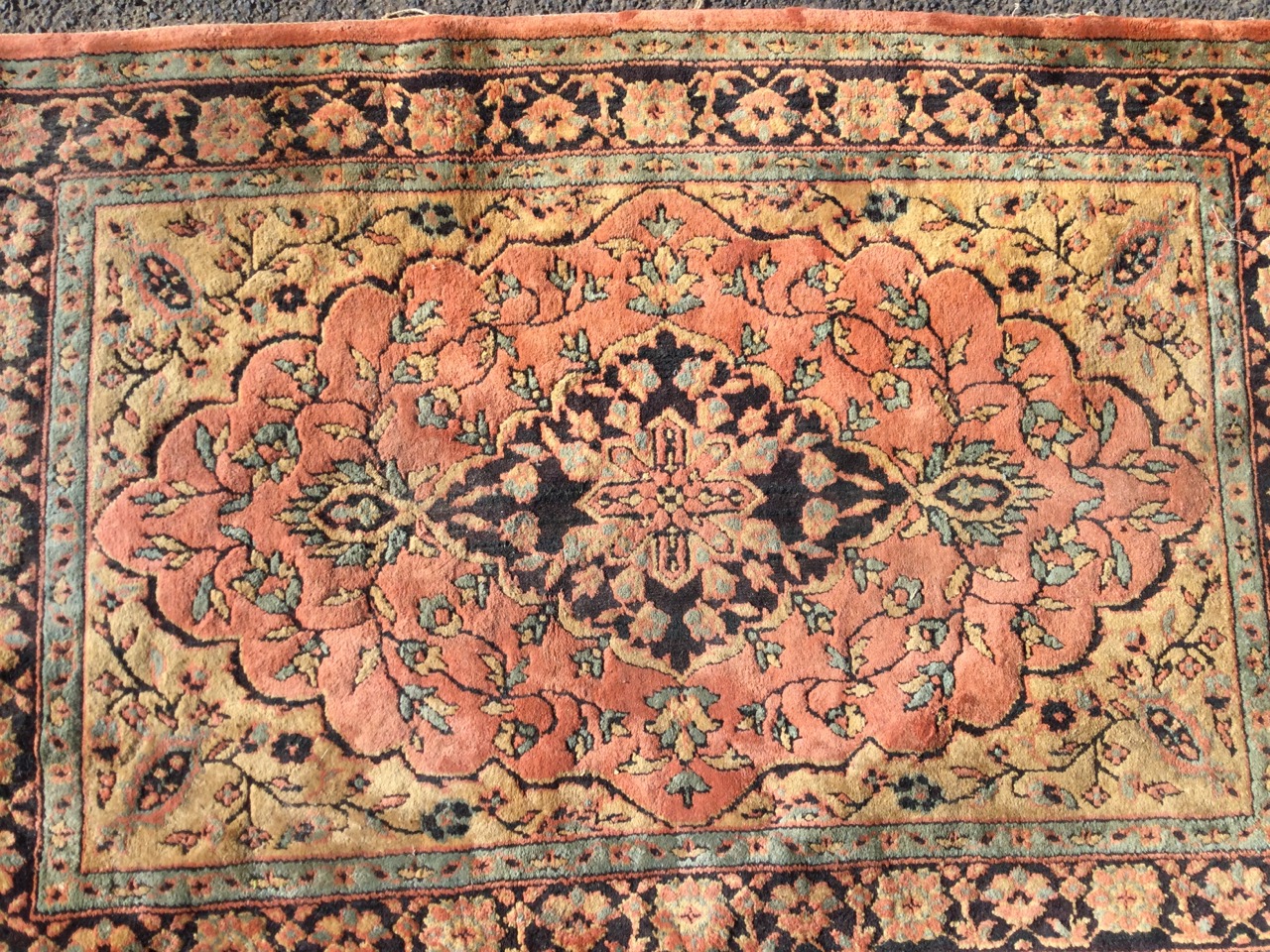 An oriental style wilton rug woven with central scalloped pink floral medallion on fawn field, the - Image 2 of 3