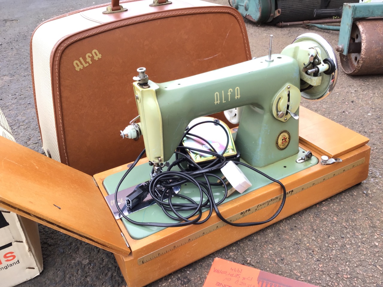 A 50s cased Alfa electric portable sewing machine; and a boxed Rank Aldis Tru-Lite QI 24 semi- - Image 3 of 3