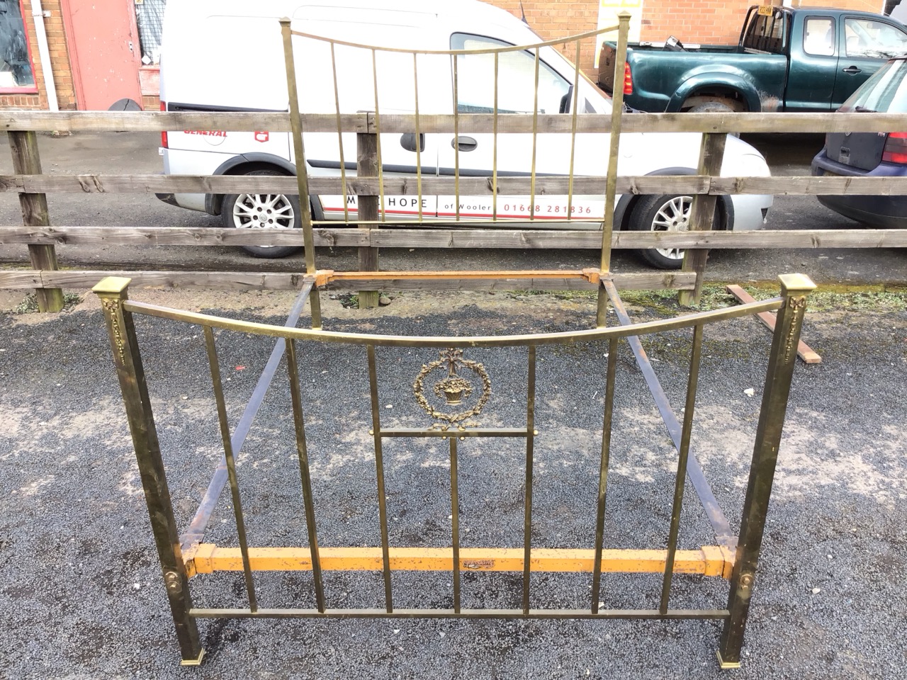 An Edwardian brass bed, the square cornerposts with cappings having applied ribbon bow decoration, - Image 2 of 3