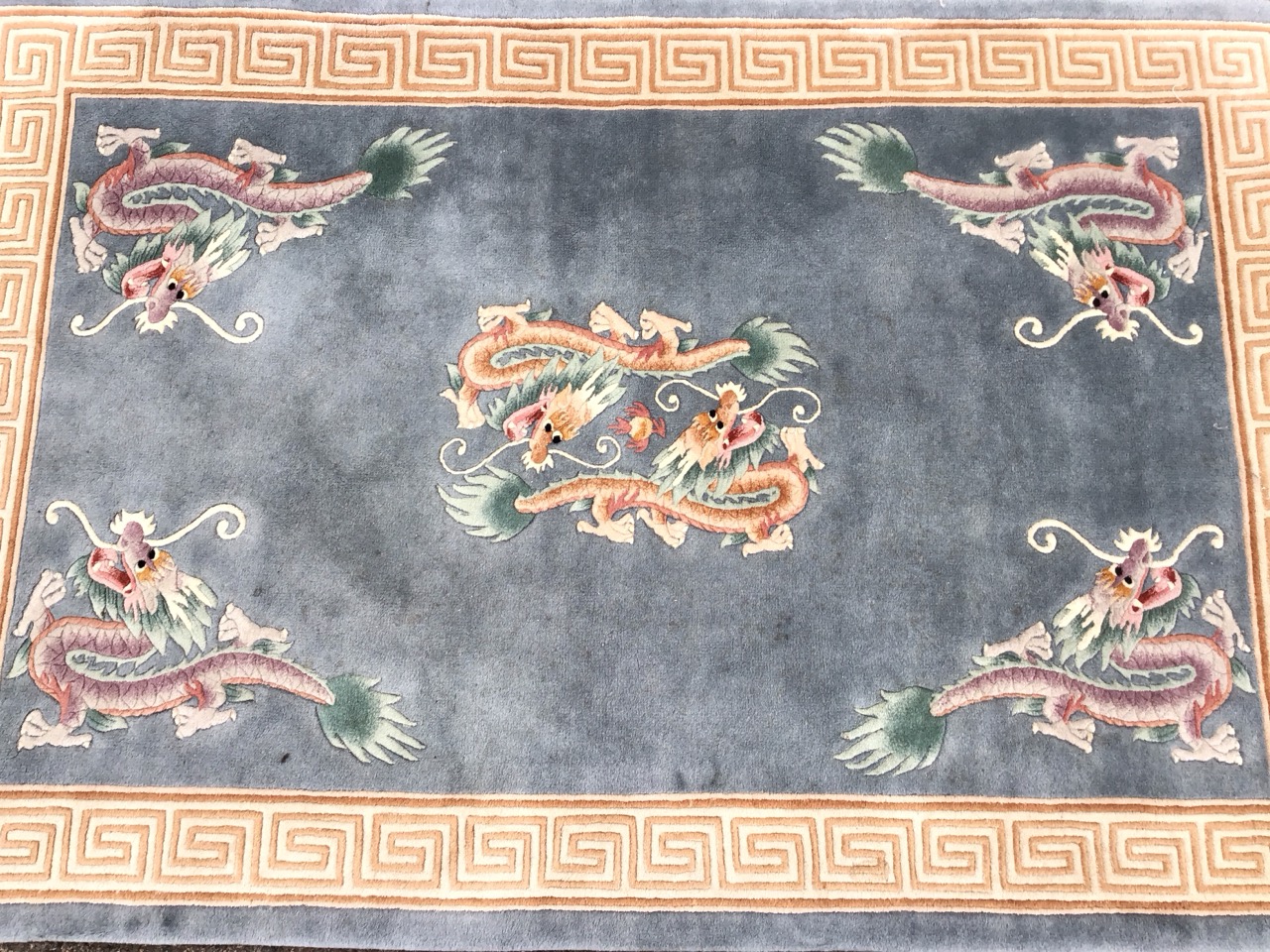 A Chinese rectangular wool rug with central medallion of dragons chasing the pearl and dragon - Image 2 of 3