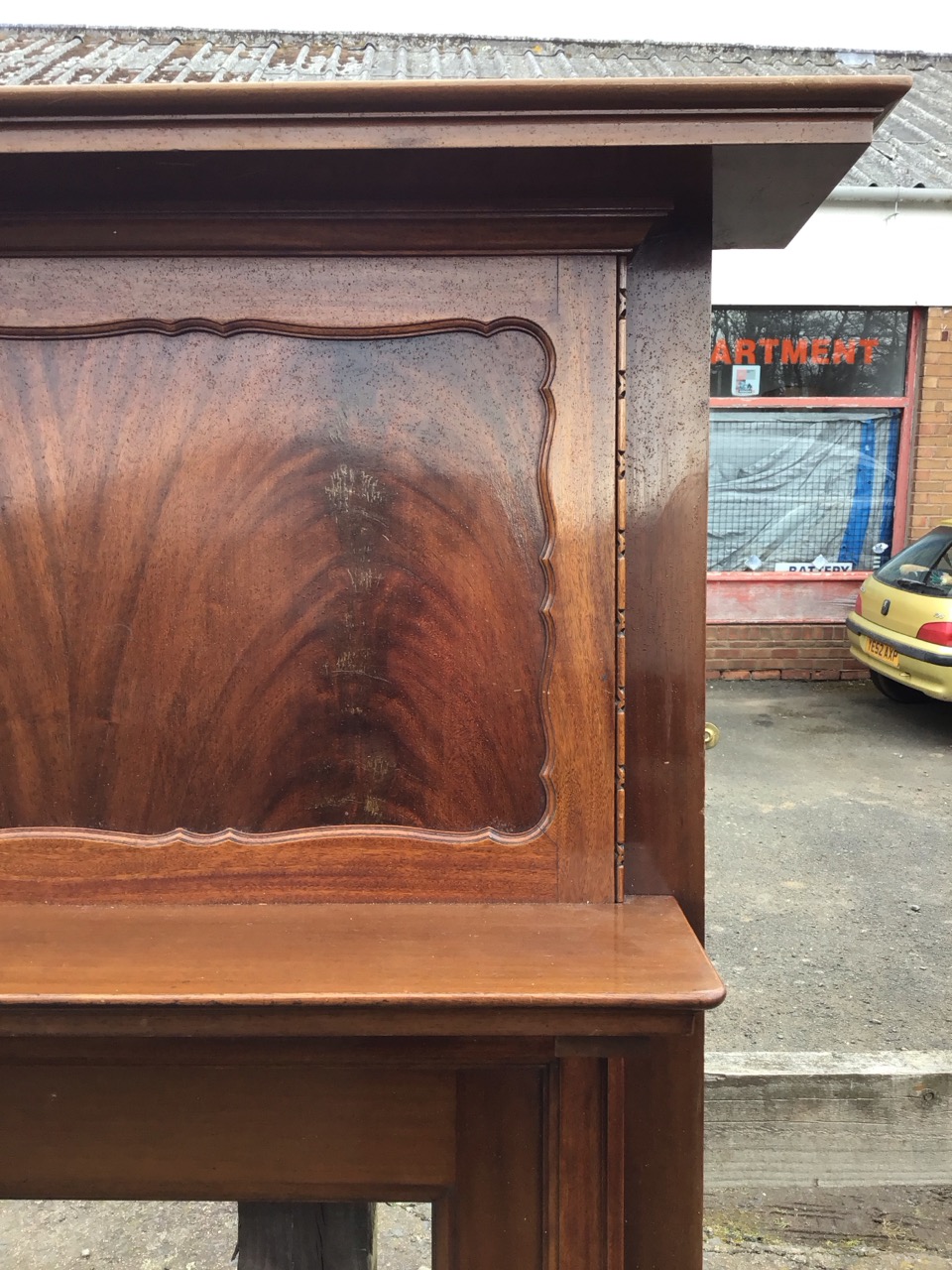 An Edwardian mahogany chimneypiece with moulded rectangular mantleshelf above a scalloped panel, - Image 2 of 3