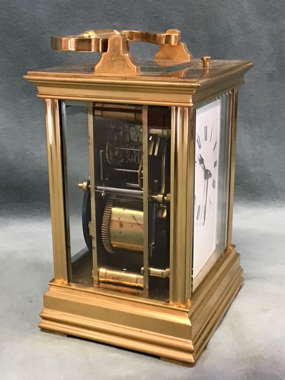 A gilt brass gorge cased repeating carriage clock, with bevelled glass panels and enamelled dial - Image 2 of 3