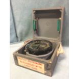 A cased gimbal mounted wartime ships compass, the type P4A instrument in working condition. (6.5in