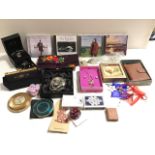 Miscellaneous collectors items - a carved miniature Boer War book, Christmas baubles, compacts