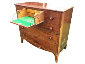 A nineteenth century mahogany secretaire chest inlaid with boxwood & ebony stringing, the central