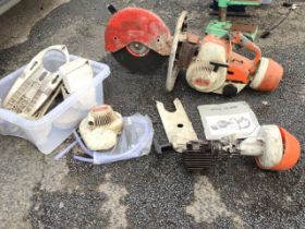 A Stihl TS 350 stone saw with instruction manual and various attachments, spares, etc. (A lot)