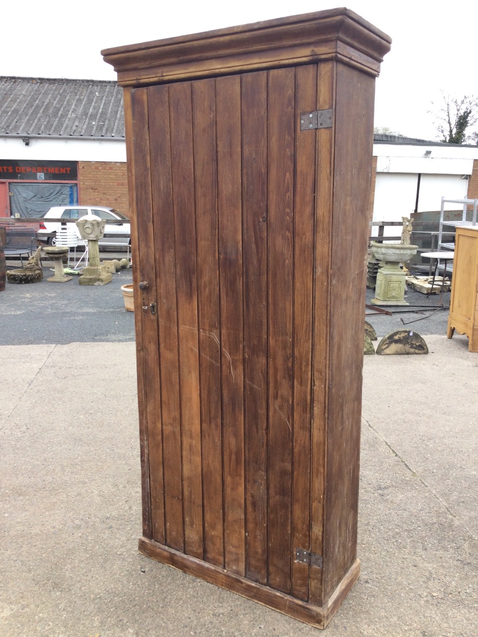 A Victorian tongue & grooved pine cupboard with hinged door enclosing shelves beneath a moulded - Image 3 of 3