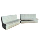 A pair of tartan upholstered benches, the rectangular backs and cushion seats raised on
