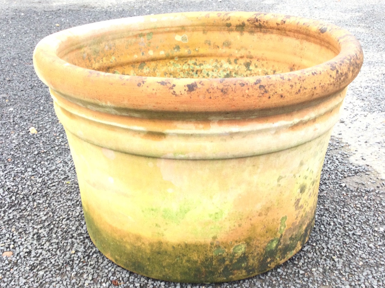 A wide terracotta garden pot with moulded rim. (19.5in x 13in)