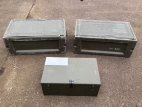 A pair of metal army avionic electrical cases with shelves and bolted covers; and a tin trunk with