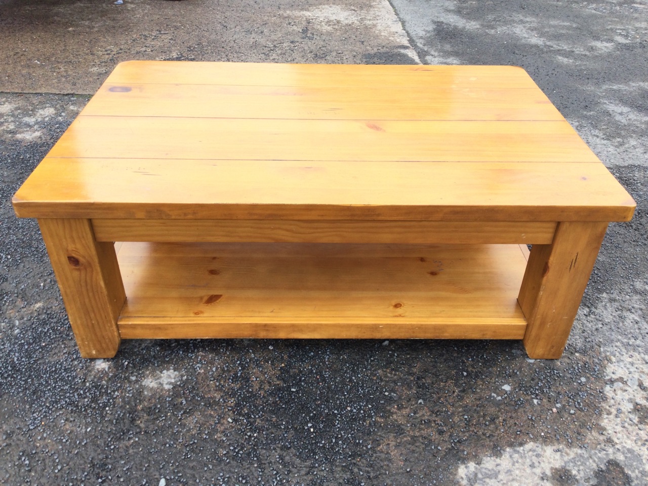 A substantial pine coffee table with rectangular four plank top raised on square legs joined by an - Image 2 of 3