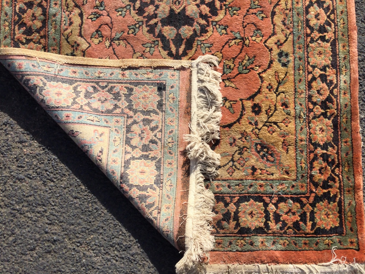 An oriental style wilton rug woven with central scalloped pink floral medallion on fawn field, the - Image 3 of 3
