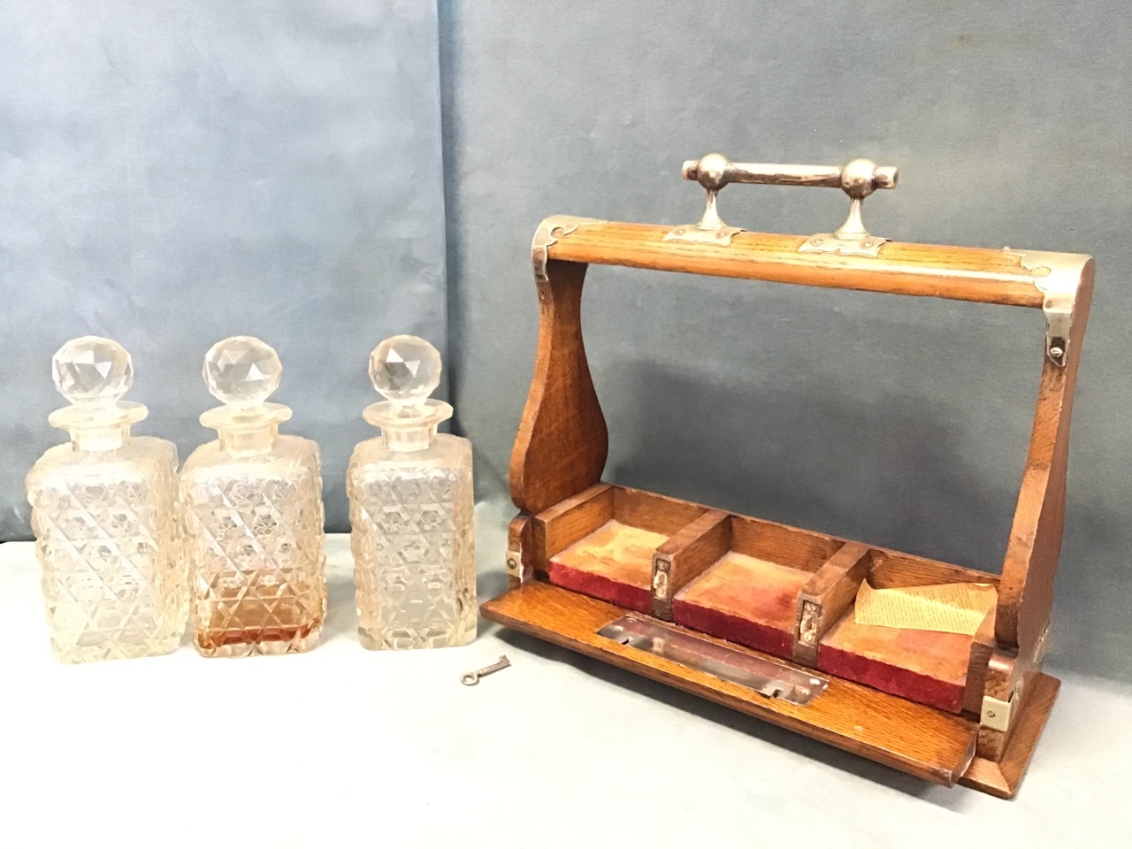 A late Victorian oak tantalus with silver plated mounts, the square cut glass decanters with ball - Image 2 of 3