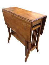 An Edwardian mahogany sutherland table with rectangular moulded top and two leaves supported on