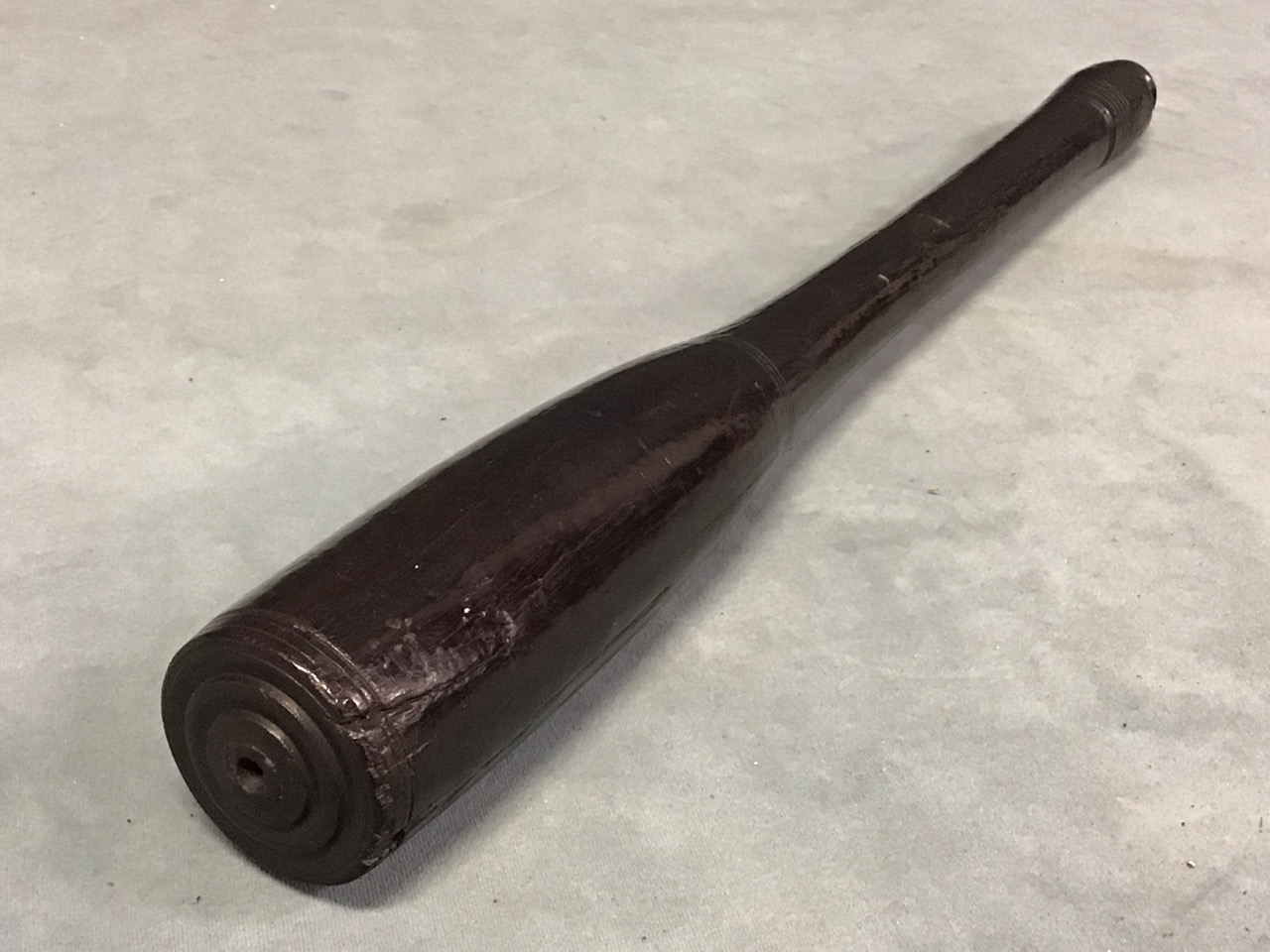 A heavy C19th turned ebony truncheon of tapered form with turned finial. (16.75in) - Image 2 of 3