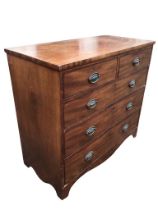 A nineteenth century mahogany chest with two short and three long cockbeaded drawers mounted with