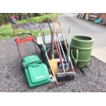 Miscellaneous gardening gear - a Qualcast Concorde 32 electric lawnmower, a kneeler, hoes, a
