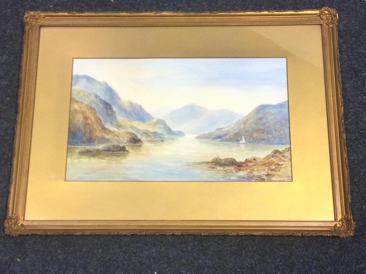 J Douglas, watercolour, coastal view with sailing boat, signed, attributed as Kyles of Bute, mounted