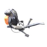 A Parker petrol engine powered knapsack leaf blower, complete with harness.