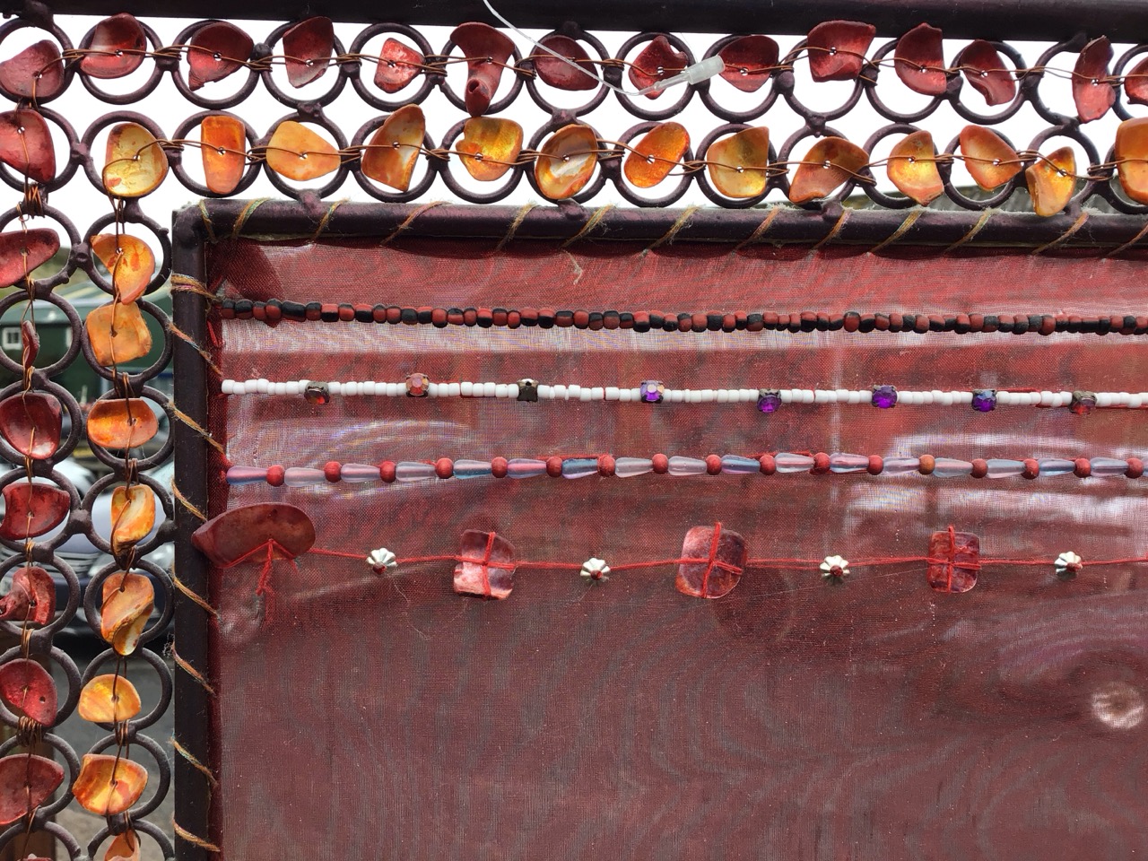 An Indian three-fold wrought iron screen with organza panels embroidered with stars and beaded bands - Image 2 of 3