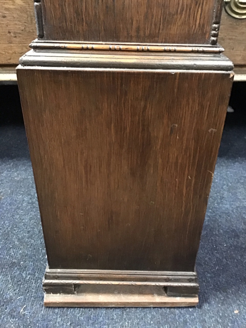 A 30s oak hood grandmother clock with reel & bead applied vorders, having arched above a circular - Image 3 of 3