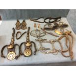 Miscellaneous horse tack - bits, pairs of stirrups - one dated 1914, straps/belts, horse brasses