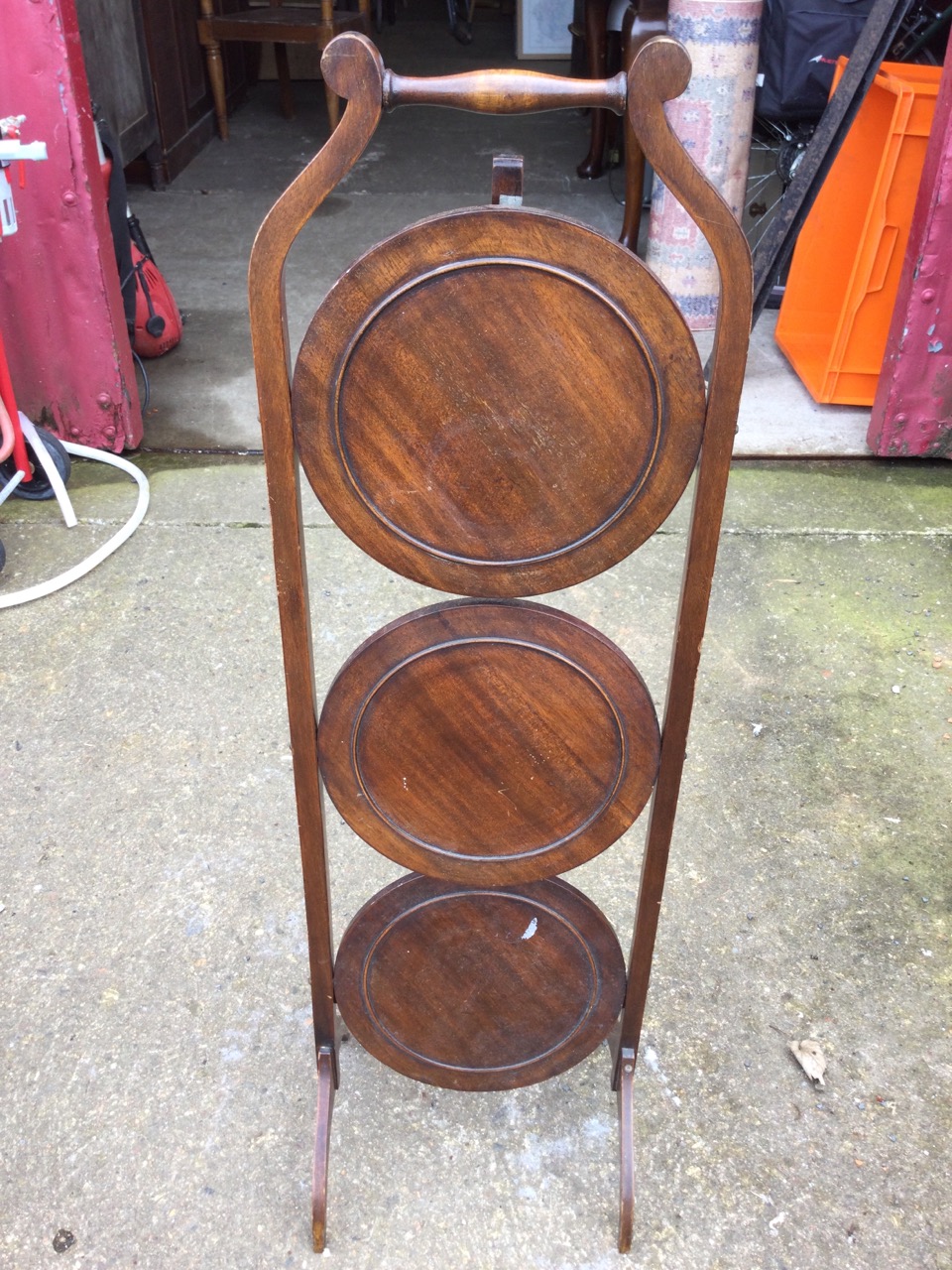 An Edwardian three-tier folding cakestand with turned handle above circular beaded shelves, raised - Image 2 of 3