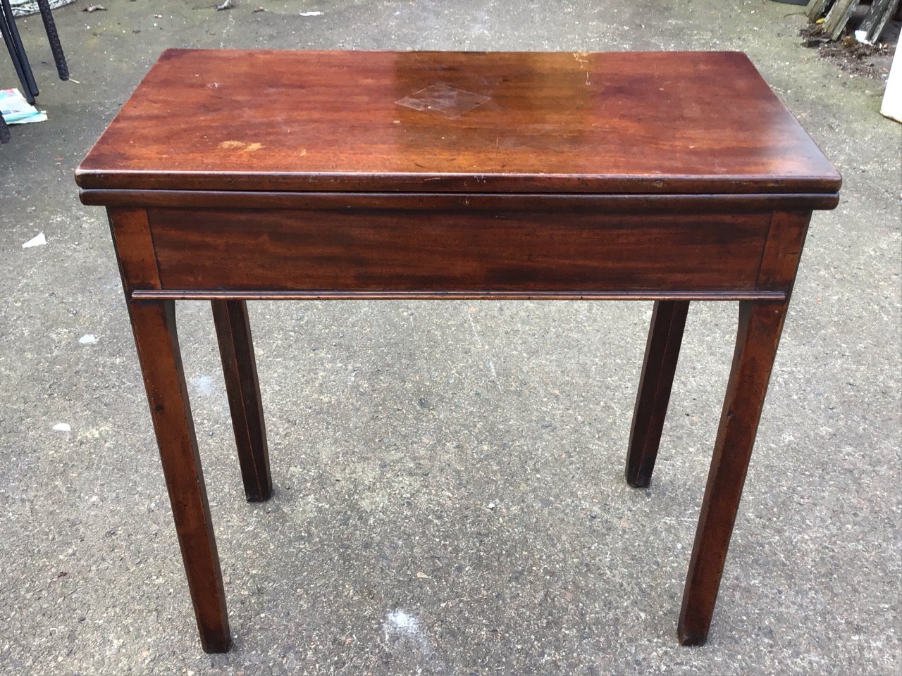 A George III mahogany turn-over-top tea table, the twin leaves opening on a swing leg, above a - Image 3 of 3