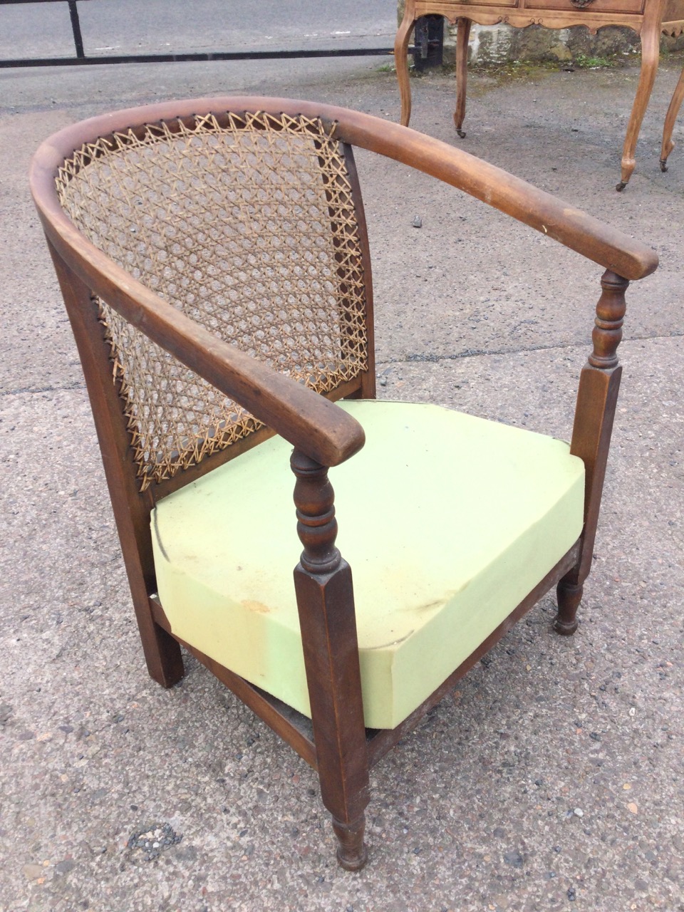 A 20s beech low armchair with caned horseshoe shaped back, and arms on turned supports, above a - Image 3 of 3