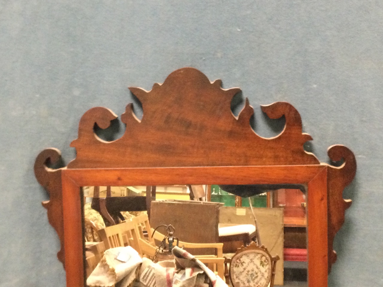 A Georgian style mahogany wall mirror, the fretwork scrolled crest above a rectangular plate in - Image 3 of 3