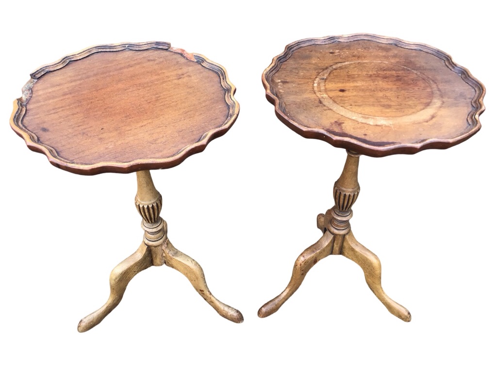 A pair of circular scalloped tray-top side tables supported on turned fluted columns with tripartite