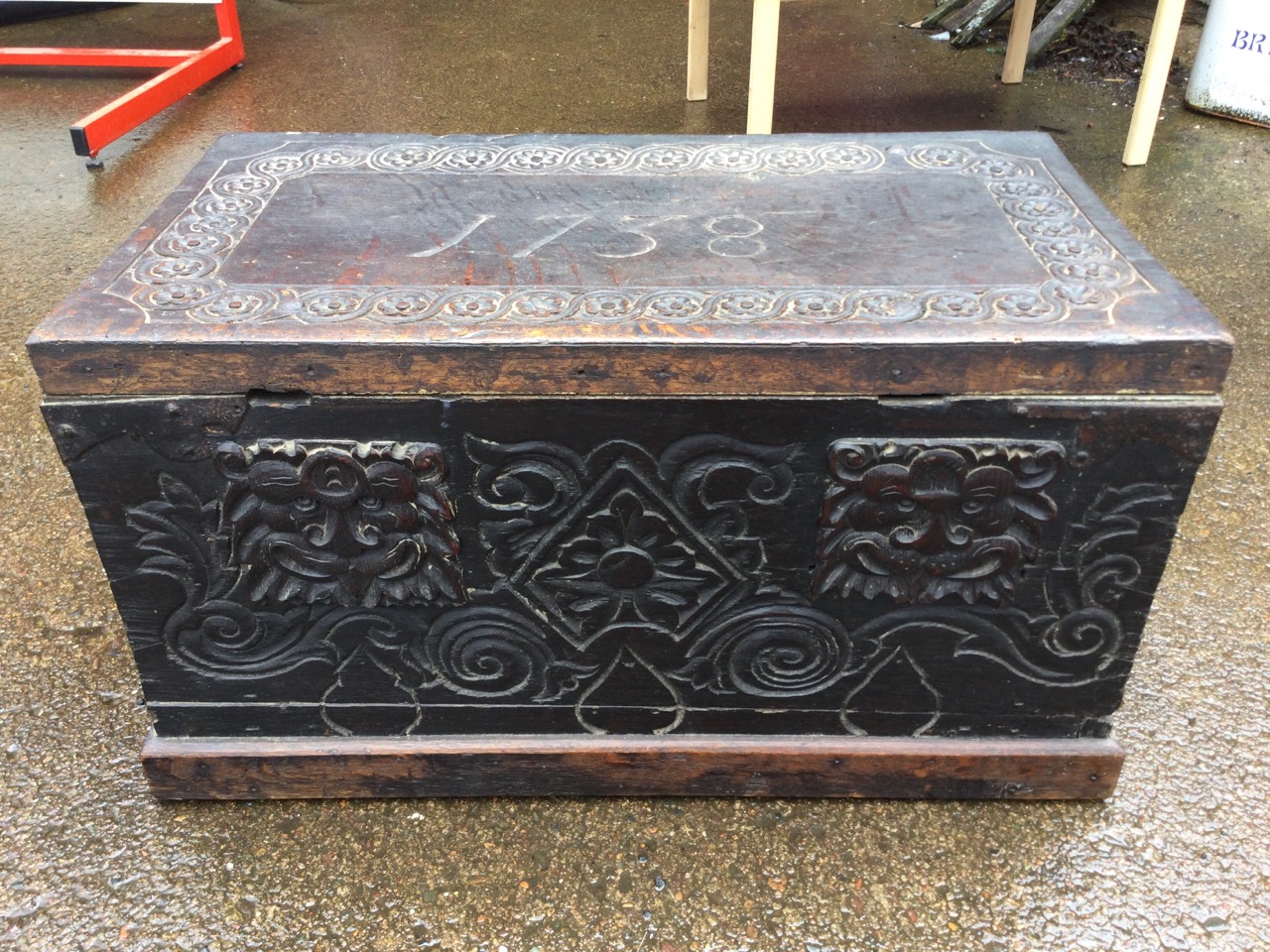 A Victorian carved oak coffer with naïve scrolled decoration, having twin applied lionmask mounts to - Bild 2 aus 3