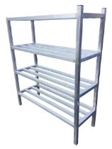A set of 4ft free-standing aluminium shelves of box section, with four platforms of battens on