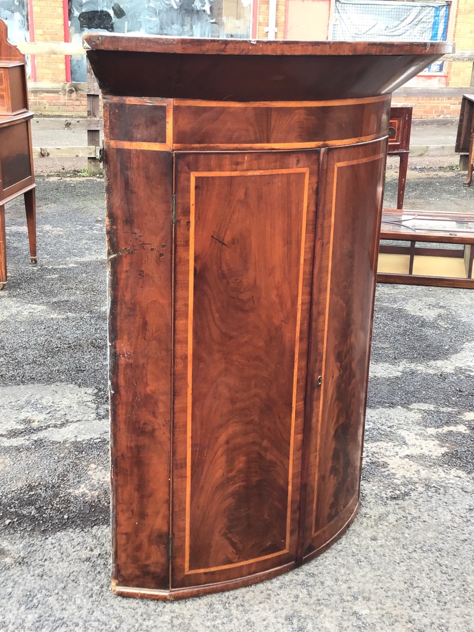 A C19th mahogany bowfronted hanging corner cabinet, the deep cornice and frieze above a pair of - Image 3 of 3