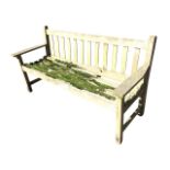 A 5ft Lister teak garden bench with slatted back and dished seat, having shaped platform arms raised