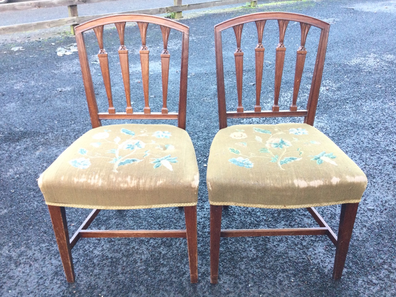 A pair of C19th mahogany Sheraton style chairs with arched backs framing leaf carved tapering - Image 2 of 3