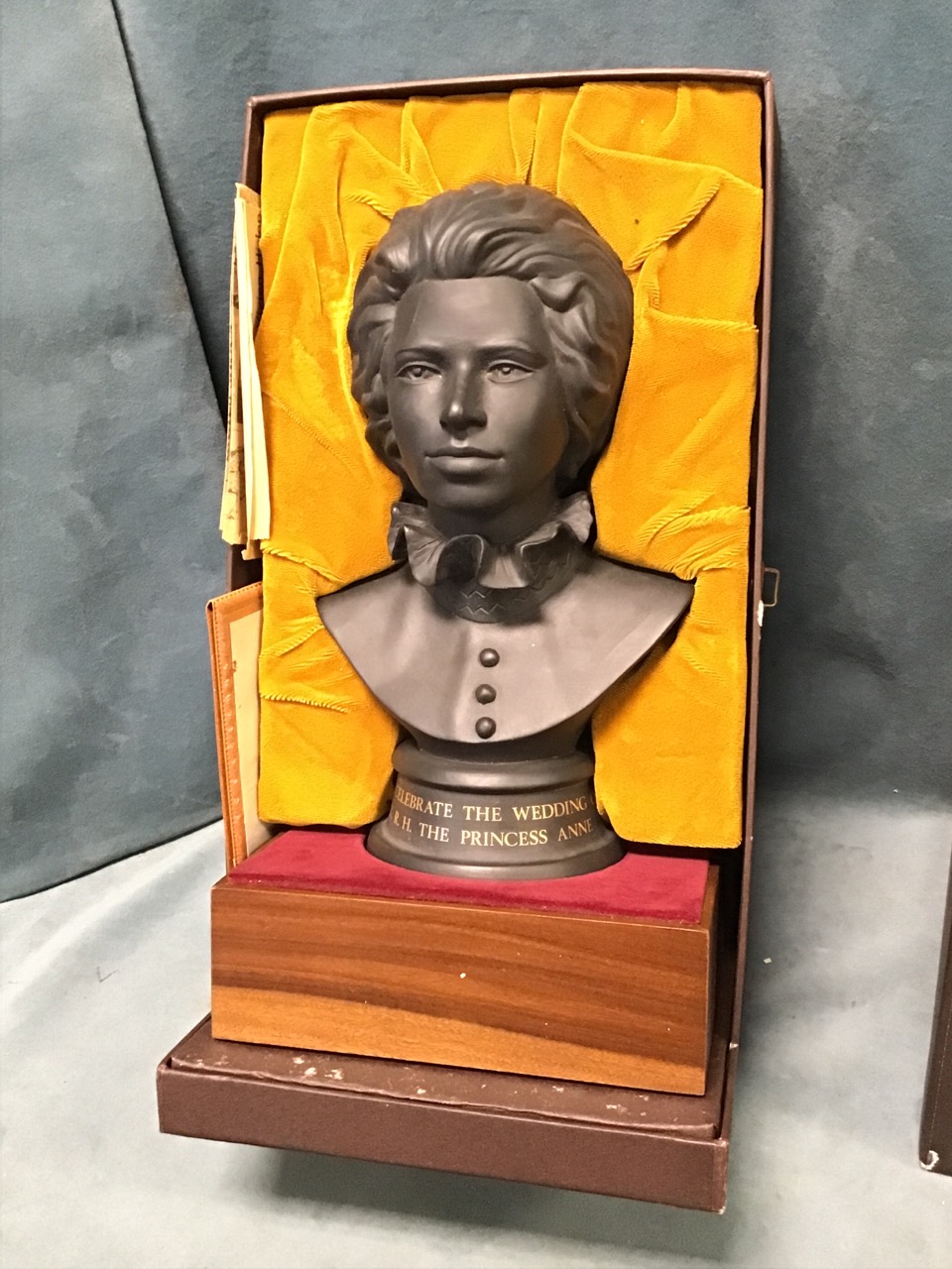 A boxed & numbered Royal Doulton bust of Princess Anne from 1973, the black basalt modelled figure