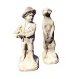A composition stone garden meerkat figurine, the beast standing on his haunches; and a garden statue