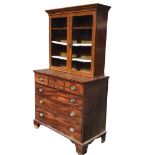 An Edwardian mahogany cabinet top with glazed doors raised on an associated Georgian mahogany