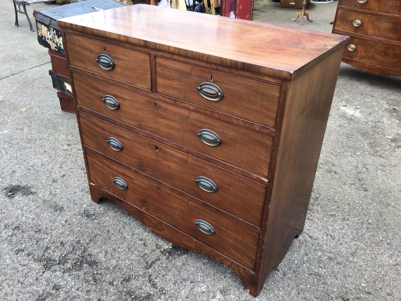 A nineteenth century mahogany chest with two short and three long cockbeaded drawers mounted with - Image 3 of 3