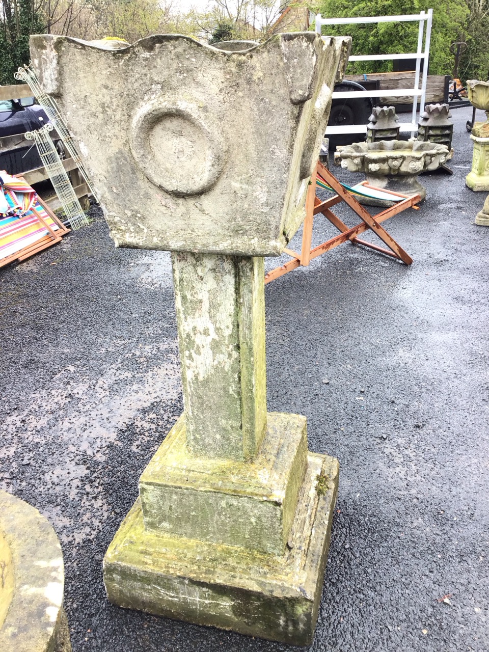 A large composition stone garden urn on square stepped moulded column, the tapering tub with waved - Image 2 of 3