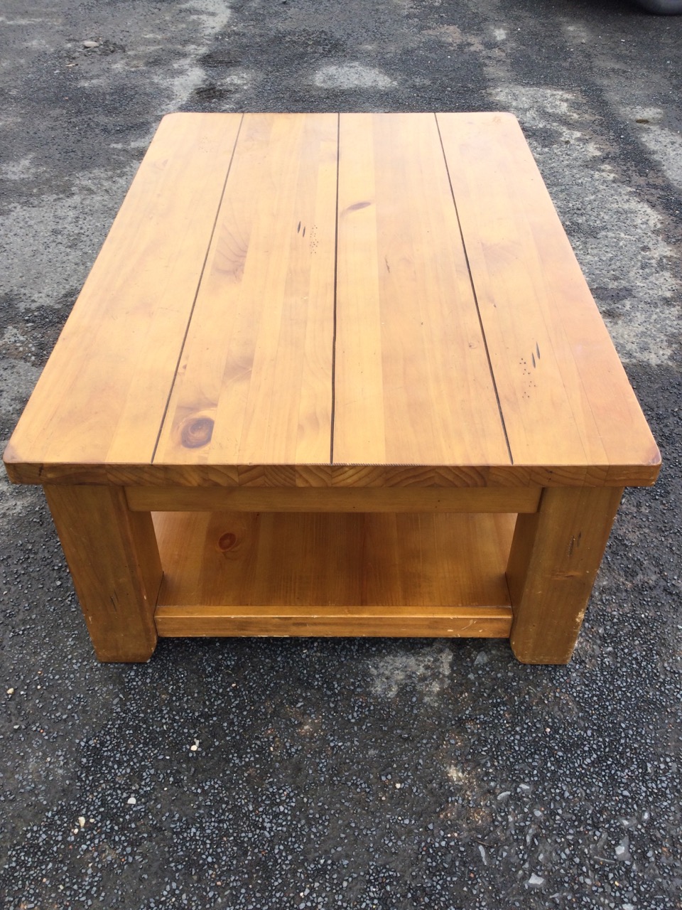 A substantial pine coffee table with rectangular four plank top raised on square legs joined by an - Image 3 of 3