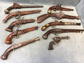 A collection of miscellaneous replica flintlock pistols including a blunderbuss; an Ottoman