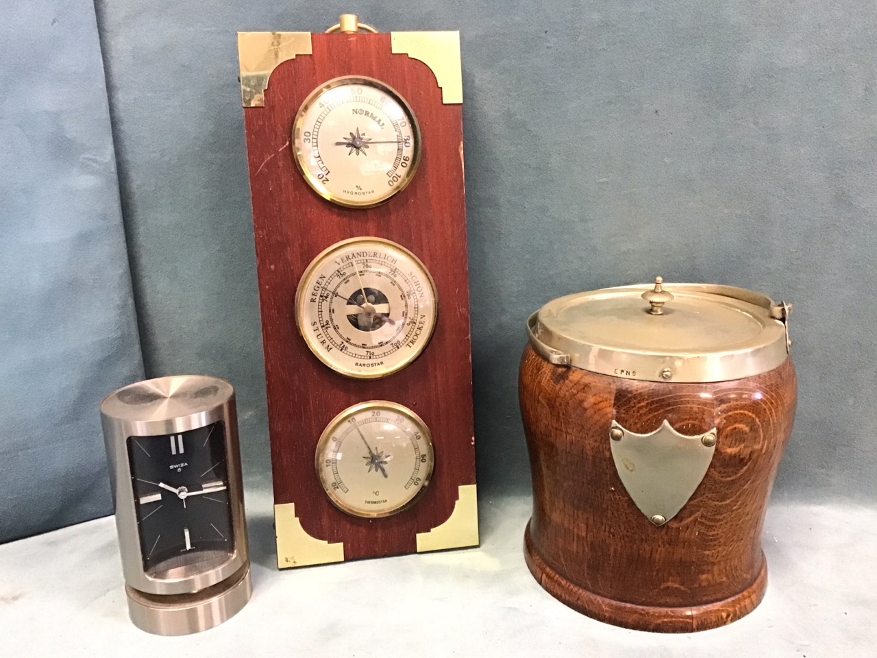 A contemporary cylindrical Swiza stainless steel alarm clock; an oval brass carriage clock by - Image 3 of 3