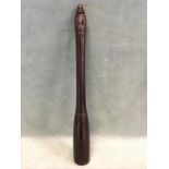A heavy C19th turned ebony truncheon of tapered form with turned finial. (16.75in)