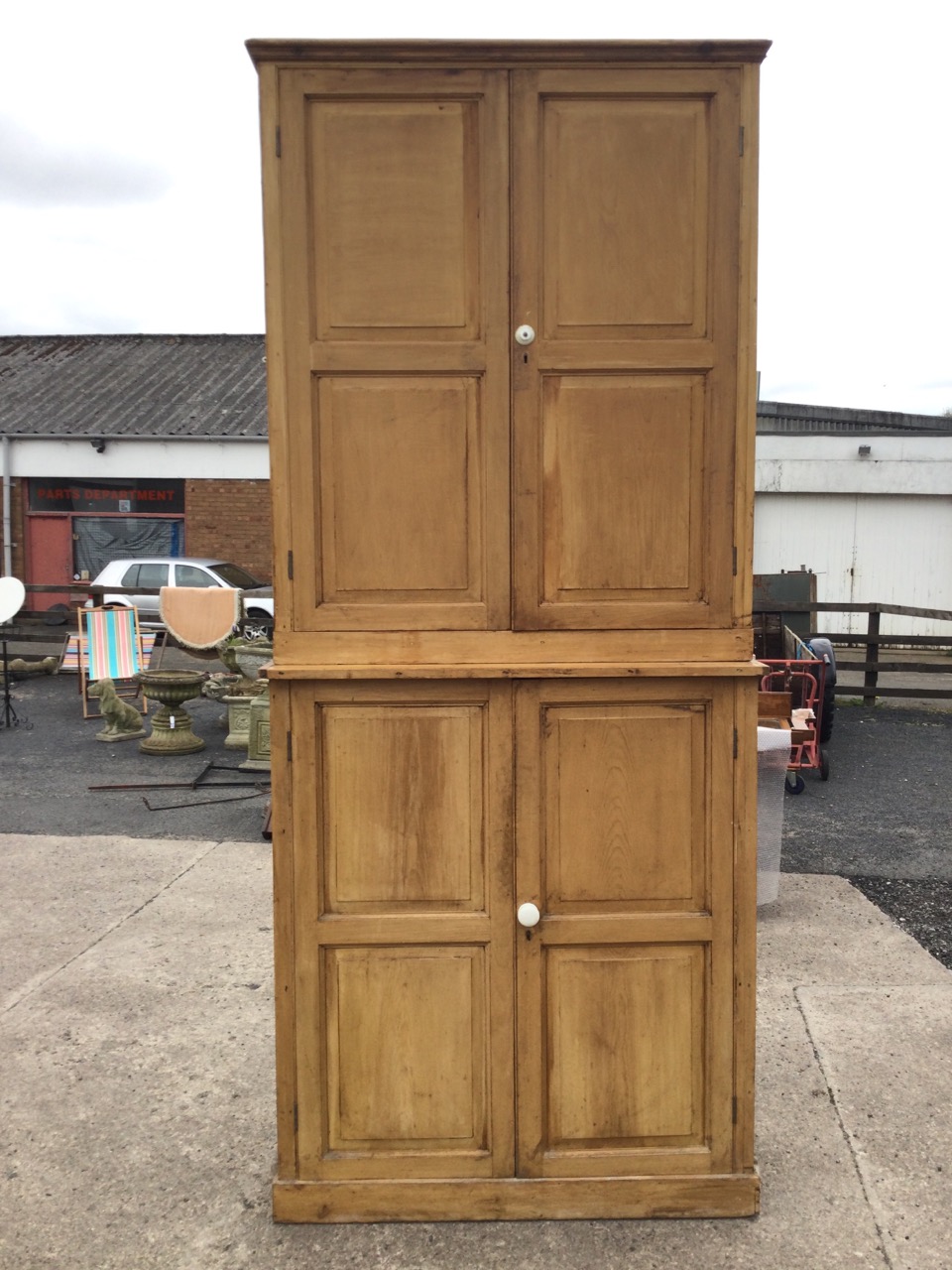 Two Victorian pine cupboards married to make a tall cabinet, each piece with four fielded panelled - Image 2 of 3